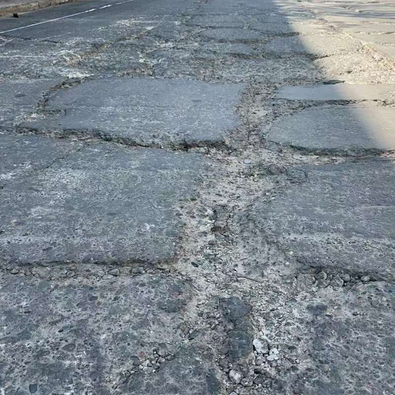 灵山路面起砂露石子修补料